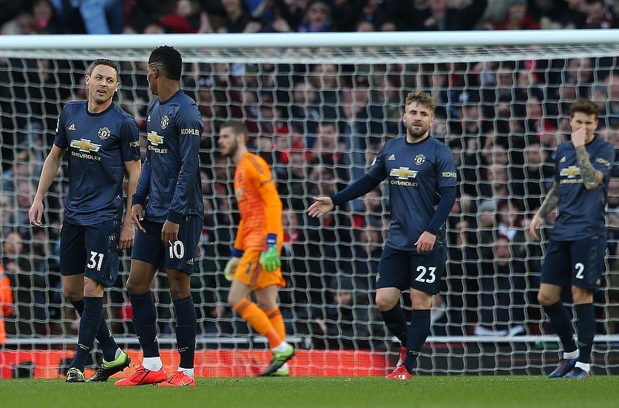 Manchester United có một ngày thi đấu đáng quên tại Emirates. Ảnh: Getty