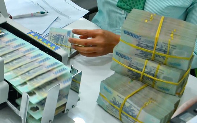 Lãi suất huy động VND hiện nay phổ biến ở mức 0,5-1%/năm đối với tiền gửi không kỳ hạn (Ảnh TL)