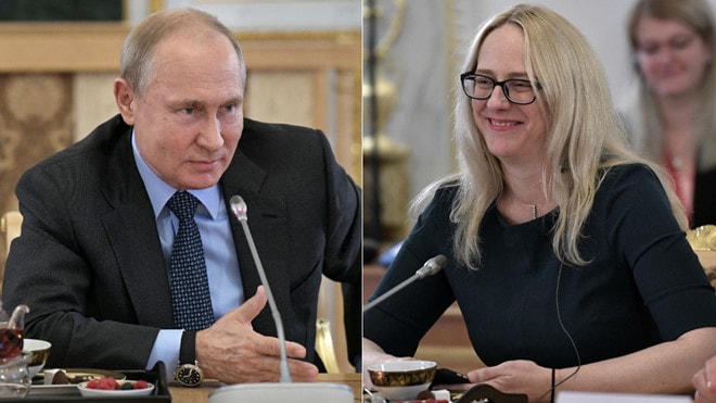 Tổng thống Vladimir Putin và nữ nhà báo Mỹ Rosalind Mathieson bên lề diễn đàn kinh tế Saint Petersburg