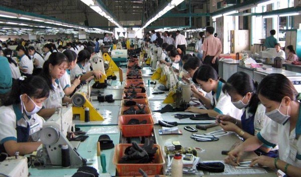 Hiện doanh nghiệp xuất khẩu hai mặt hàng dệt may và da giày đang tận dụng rất tốt quy tắc xuất xứ theo quy định của CPTPP khi xuất khẩu sang thị trường Canada. (Ảnh TL)