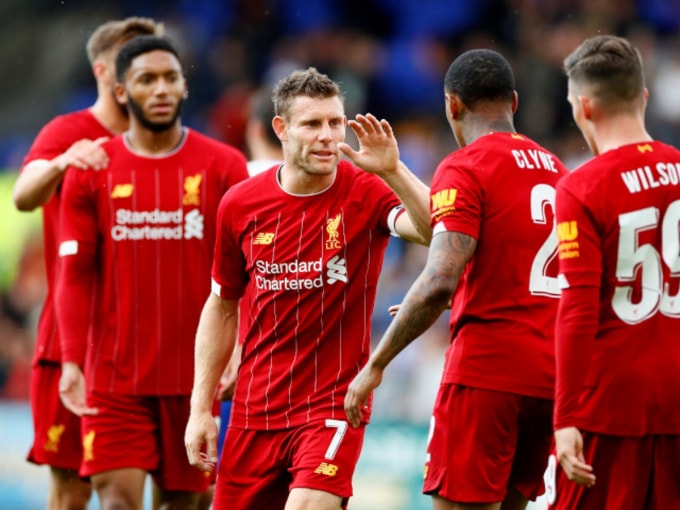 Các cầu thủ Liverpool ăn mừng bàn thắng mở tỷ số. Ảnh: Getty