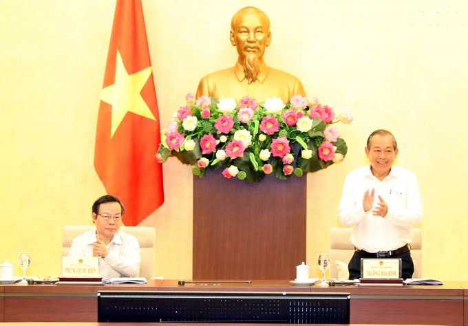 Phó Thủ tướng Thường trực Chính phủ Trương Hòa Bình và Phó Chủ tịch Quốc hội Phùng Quốc Hiển đồng chủ trì cuộc làm việc. Ảnh: VGP
