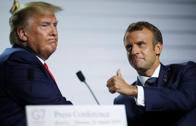 Tổng thống Mỹ Donald Trump (trái) và Tổng thống Pháp Emmanuel Macron. Ảnh: Reuters