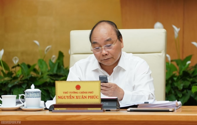 Thủ tướng Nguyễn Xuân Phúc nhắn tin ủng hộ người nghèo. Ảnh VGP