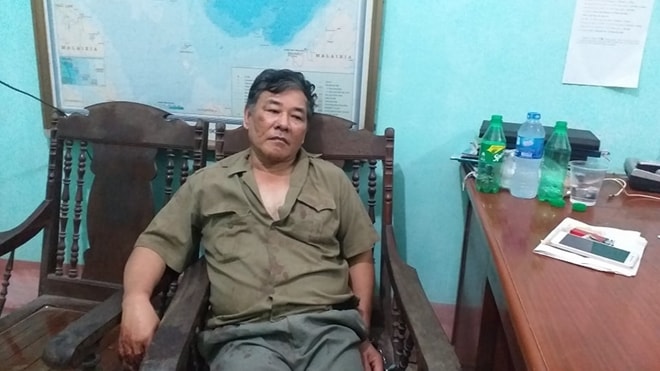 Hung thủ Bùi Xuân Hồng ở cơ quan Công An. Ảnh TL.