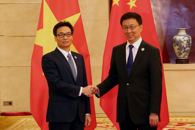 hó Thủ tướng Vũ Đức Đam và Phó Thủ tướng Trung Quốc Hàn Chính. Ảnh: VGP