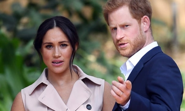 Hoàng tử Harry và vợ Meghan Markle. Ảnh: TG