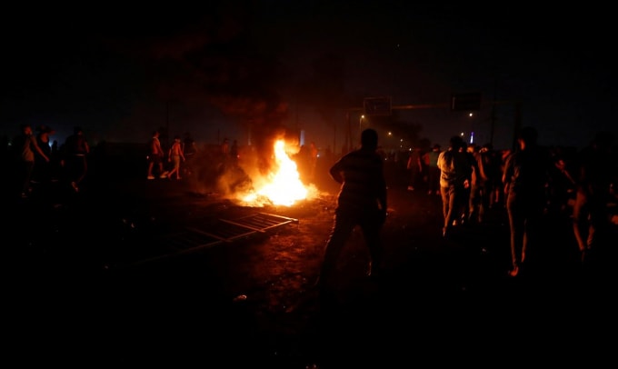 Người biểu tình tại thủ đô Baghdad. Ảnh: Reuters