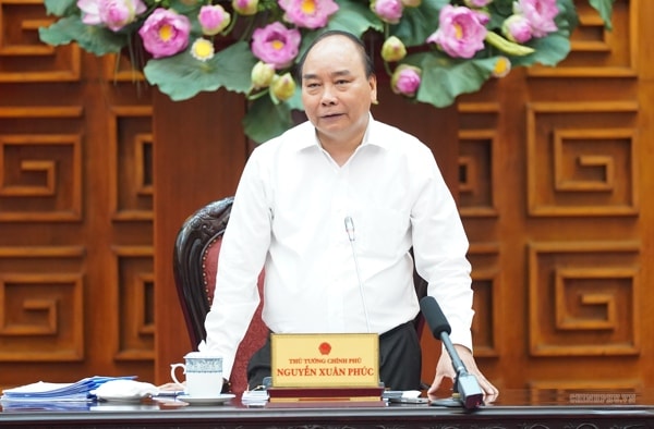Thủ tướng Chính phủ Nguyễn Xuân Phúc yêu cầu các bộ ngành rà soát, xử lý vướng mắc phát sinh trong triển khai thi hành một số luật lĩnh vực đầu tư, kinh doanh. Ảnh: TL