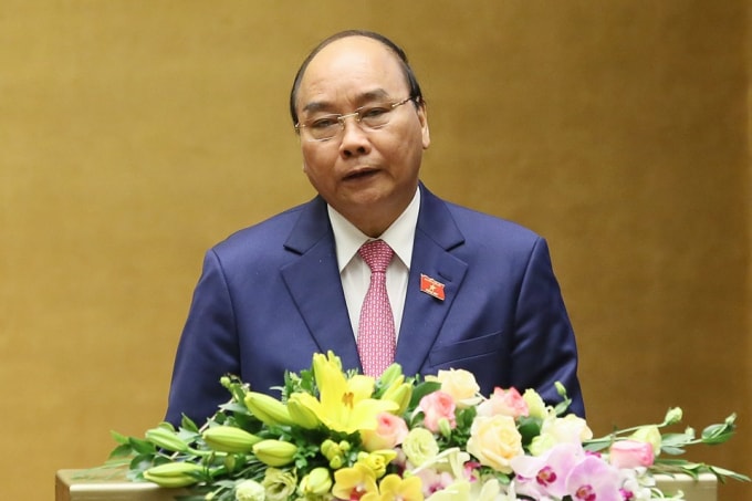 Thủ tướng Nguyễn Xuân Phúc trình bày báo cáo trước Quốc hội về tình hình năm 2019 và kế hoạch phát triển kinh tế-xã hội năm 2020.