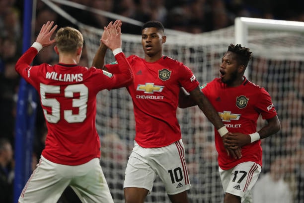 Rashford có 1 ngày thi đấu ấn tượng với cú đúp vào lưới Chelsea. Ảnh: Getty