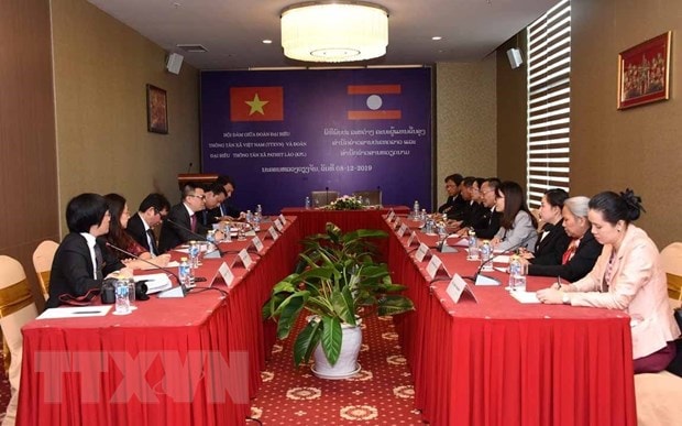 Quang cảnh buổi hội đàm giữa Đoàn đại biểu Thông tấn xã Việt Nam và Đoàn đại biểu Thông tấn xã Pathet Lào. Ảnh: Phạm Kiên/TTXVN