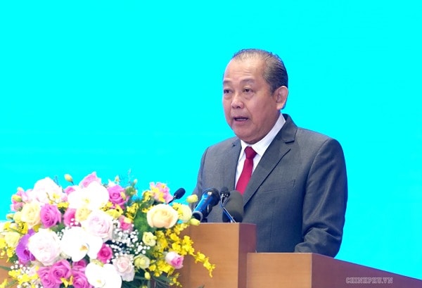 Phó Thủ tướng Thường trực Chính phủ Trương Hoà Bình báo cáo tại Hội nghị. Ảnh: VGP