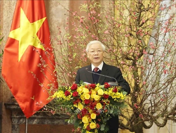 Tổng Bí thư, Chủ tịch nước Nguyễn Phú Trọng chúc Tết các đồng chí lão thành cách mạng, lãnh đạo, nguyên lãnh đạo Đảng, Nhà nước, MTTQ Việt Nam, đồng bào, chiến sỹ cả nước và kiều bào ta ở nước ngoài. Ảnh: TTXVN