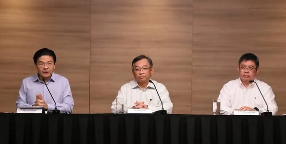 Quan chức y tế Singapore trong cuộc họp báo chiều 14/2