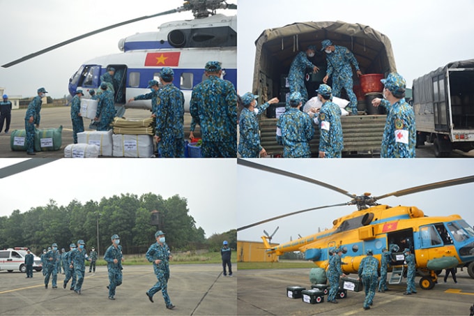 Trung đoàn 916 và Trung đoàn 918 thực hành vận chuyển trang thiết bị hậu cần, y tế cho vùng bị nhiễm dịch trong Diễn tập phòng, chống dịch COVID-19. Ảnh: VGP
