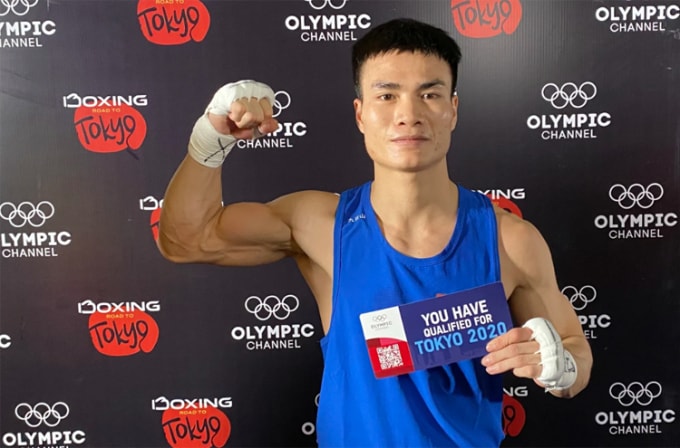 Nguyễn Văn Đương thắng thuyết phục đối thủ Thái Lan đoạt vé dự Olympic Tokyo 2020. Ảnh: T.L