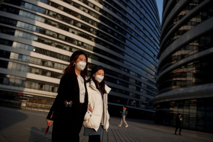 Người dân tại Bắc Kinh, Trung Quốc. Ảnh: Reuters