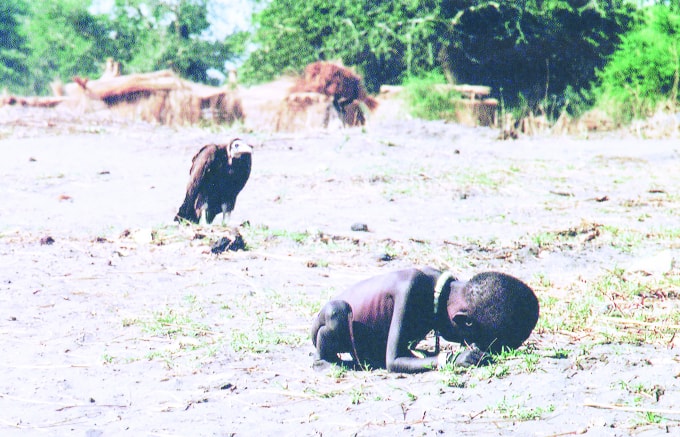 time-100-influential-photos-kevin-carter-starving-child-vulture-87