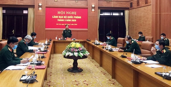 Đại tướng Ngô Xuân Lịch, Ủy viên Bộ Chính trị, Phó bí thư Quân ủy Trung ương, Bộ trưởng Bộ Quốc phòng điều hành hội nghị. Ảnh: BQP.