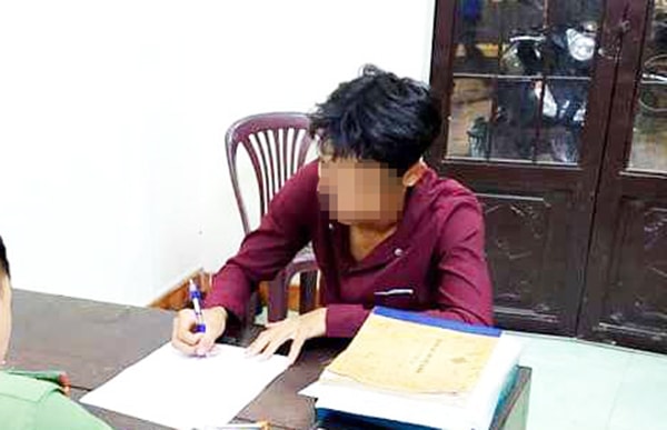 Trần Văn H. làm việc với cơ quan công an. Ảnh: L.V.
