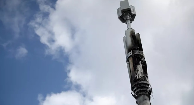 Nhiều tháp 5G bị đốt vì làn sóng phản đối tại châu Âu vì thuyết âm mưu. Ảnh: Reuters.