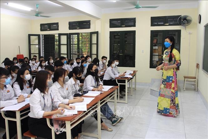 Việc tuân thủ khoảng cách khi đưa học sinh trở lại trường cần thiết được tuân thủ (ảnh minh họa - nguồn TTXVN).