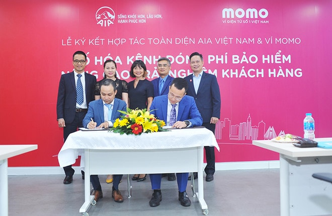 Ví điện tử MoMo và AIA hợp tác mở kênh đóng phí bảo hiểm.