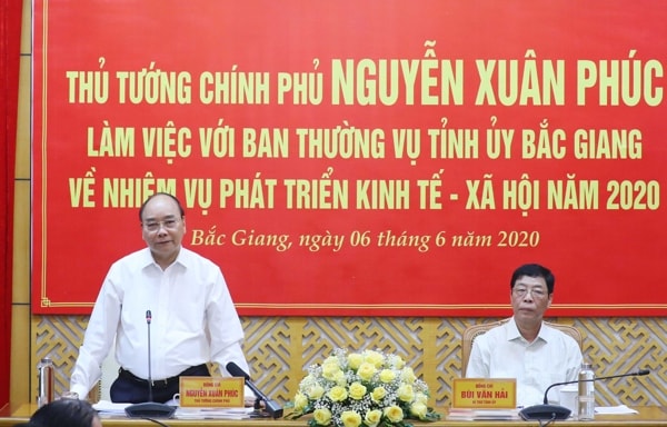 Thủ tướng đề nghị Bắc Giang thực hiện thành công mục tiêu kép, phát triển sản xuất kinh doanh. Ảnh: VGP