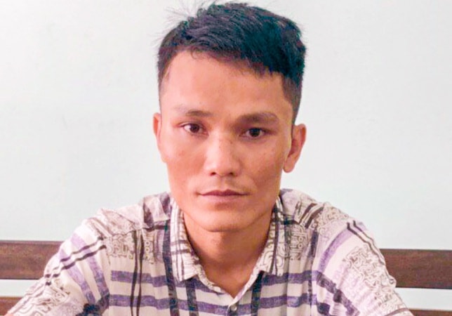 Đối tượng Nguyễn Viết Hiếu tại cơ quan Công an. Ảnh: TL