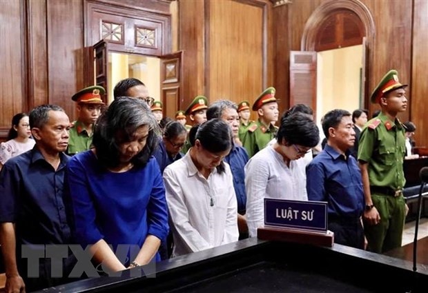 Các bị cáo nghe tuyên án ngày 22/11/2019. Ảnh: TTXVN