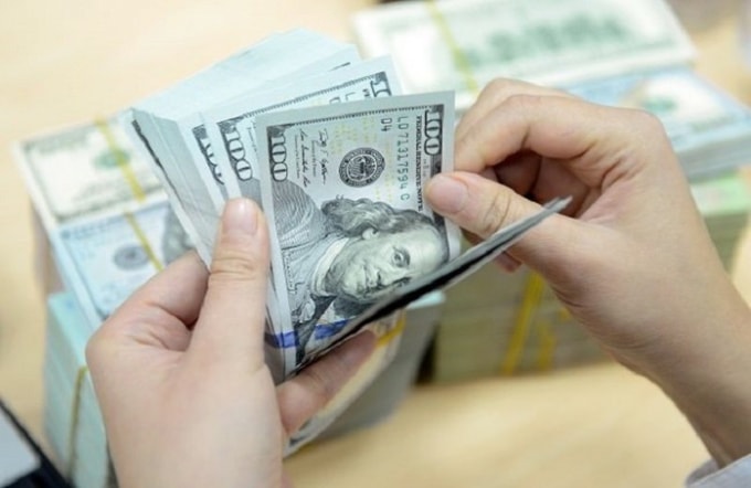Đồng USD giảm giá do nhu cầu giảm và tương lai không mấy khả quan của nền kinh tế Mỹ. Ảnh minh họa.