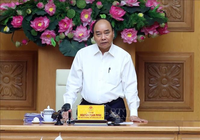 Thủ tướng Nguyễn Xuân Phúc, Chủ tịch Hội đồng - Thi đua khen thưởng Trung ương phát biểu tại cuộc họp. Ảnh: TTXVN