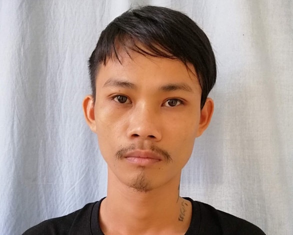 Nguyễn Hồng Hạnh tại cơ quan điều tra. Ảnh do công an cung cấp.