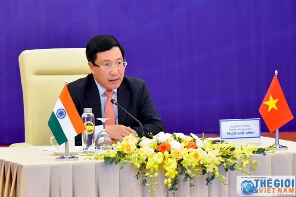Phó Thủ tướng, Bộ trưởng Bộ Ngoại giao Phạm Bình Minh dự Kỳ họp lần thứ 17 Ủy ban Hỗn hợp Việt Nam - Ấn Độ tại điểm cầu Hà Nội. Ảnh: TG&VN