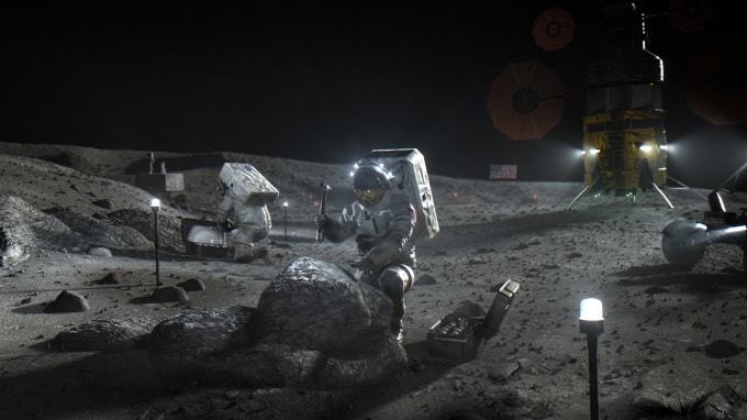 Mô tả của một nghệ sĩ về các phi hành gia đi bộ trên mặt trăng trong chương trình Artemis của NASA - Ảnh: Space