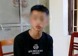 Hồ Xuân Phương T. tại cơ quan công an. Ảnh: nld.vn