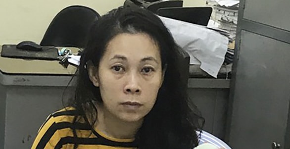 Trịnh Hữu Tú Trân bị bắt giữ tại cơ quan Công an. Ảnh: tuoitre.vn