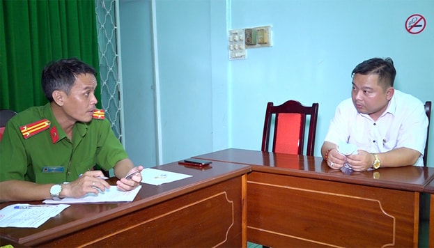 Đối tượng Lý Quang Thái làm việc với cơ quan công an.