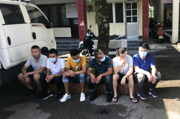 Nhóm người Trung Quốc nhập cảnh trái phép vào Việt Nam từ đường biển bị lực lượng chức năng bắt giữ. Ảnh: V.A