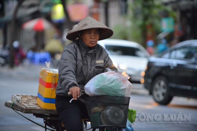 Hà Nội trời rét sáng sớm có sương mù (Ảnh: Quang Hùng)