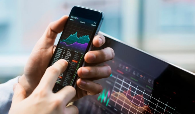Đối diện với áp lực nghỉ Tết... nhưng VN-Index vẫn duy trì được sắc xanh.