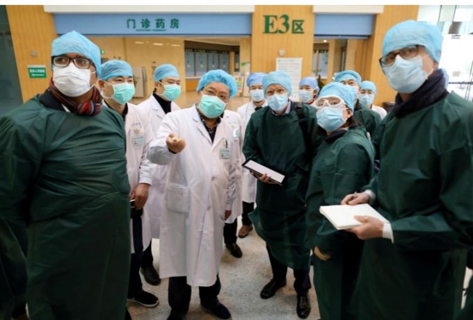 Nhóm của WHO phối hợp điều tra với các đồng nghiệp Trung Quốc tại Vũ Hán - Ảnh: Reuters