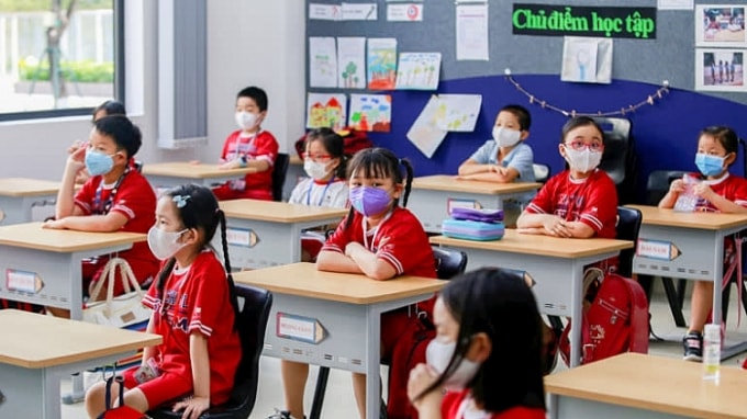 Học sinh TP. Hồ Chí Minh đi học trở lại vào ngày 1/3 (ảnh TL).