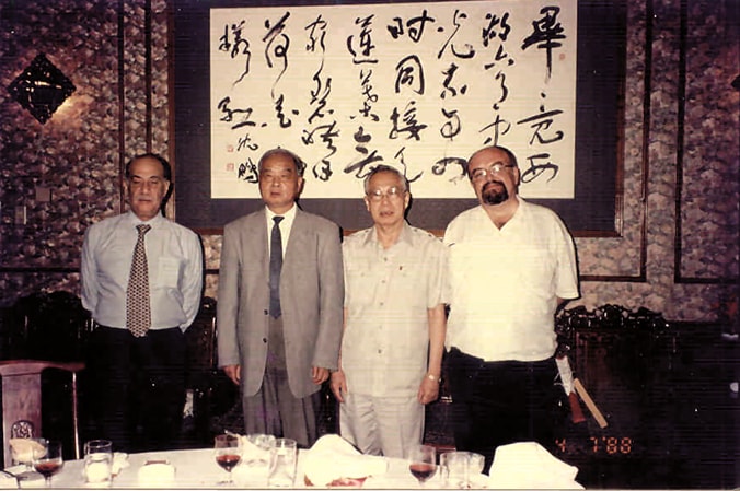 Đoàn lãnh đạo OIJ làm việc tại Bắc Kinh năm 1997. Từ trái: Chủ tịch OIJ Suleiman Al-Qudah, Chủ tịch Hội nhà báo toàn Trung Quốc Triệu Hoa Trạch, Chủ tịch Hội nhà báo Việt Nam Phan Quang, Ủy viên Ban Thư ký, Thủ quỹ OIJ Alexander Angelov.