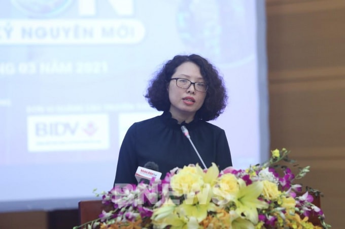 Bà Tạ Thanh Bình - Vụ trưởng Vụ Phát triển thị trường (Ủy ban Chứng khoán Nhà nước) phát biểu tại Diễn đàn phát triển thị trường vốn tổ chức sáng nay 30/3.