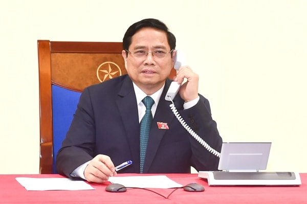 Thủ tướng Phạm Minh Chính điện đàm với Thủ tướng Lào Phankham Viphavanh. Ảnh: VGP