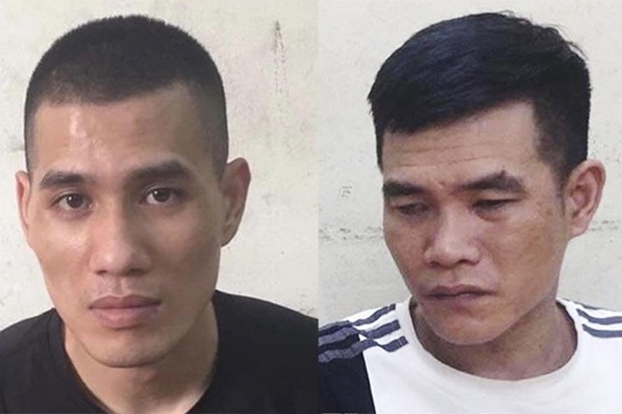 Hai bị can Giang và Hùng (từ trái qua) đập phá ôtô để trộm cắp tài sản. Ảnh: CACC