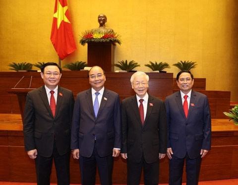 Tổng bí thư Nguyễn Phú Trọng, Chủ tịch nước Nguyễn Xuân Phúc, Thủ tướng Phạm Minh Chính, Chủ tịch Quốc hội Vương Đình Huệ tại kỳ họp thứ 11 Quốc hội khóa XIV.