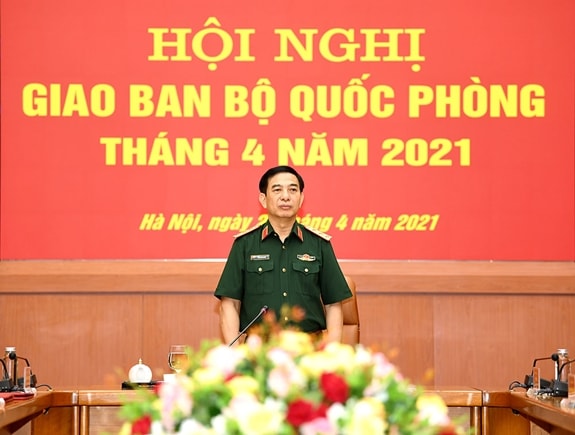 Thượng tướng Phan Văn Giang, Ủy viên Bộ Chính trị, Phó Bí thư Quân ủy Trung ương, Bộ trưởng Bộ Quốc phòng phát biểu tại Hội nghị. Ảnh: Hoàng Hà